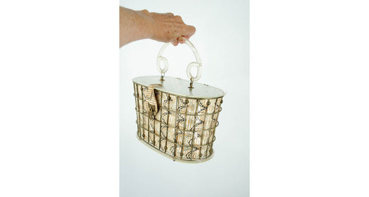 1950s basket cage purse with clear lucite top and textured gold and black vinyl insert