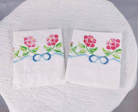 Vintage cross stitched pillow cases pink roses blue bows cottage chic