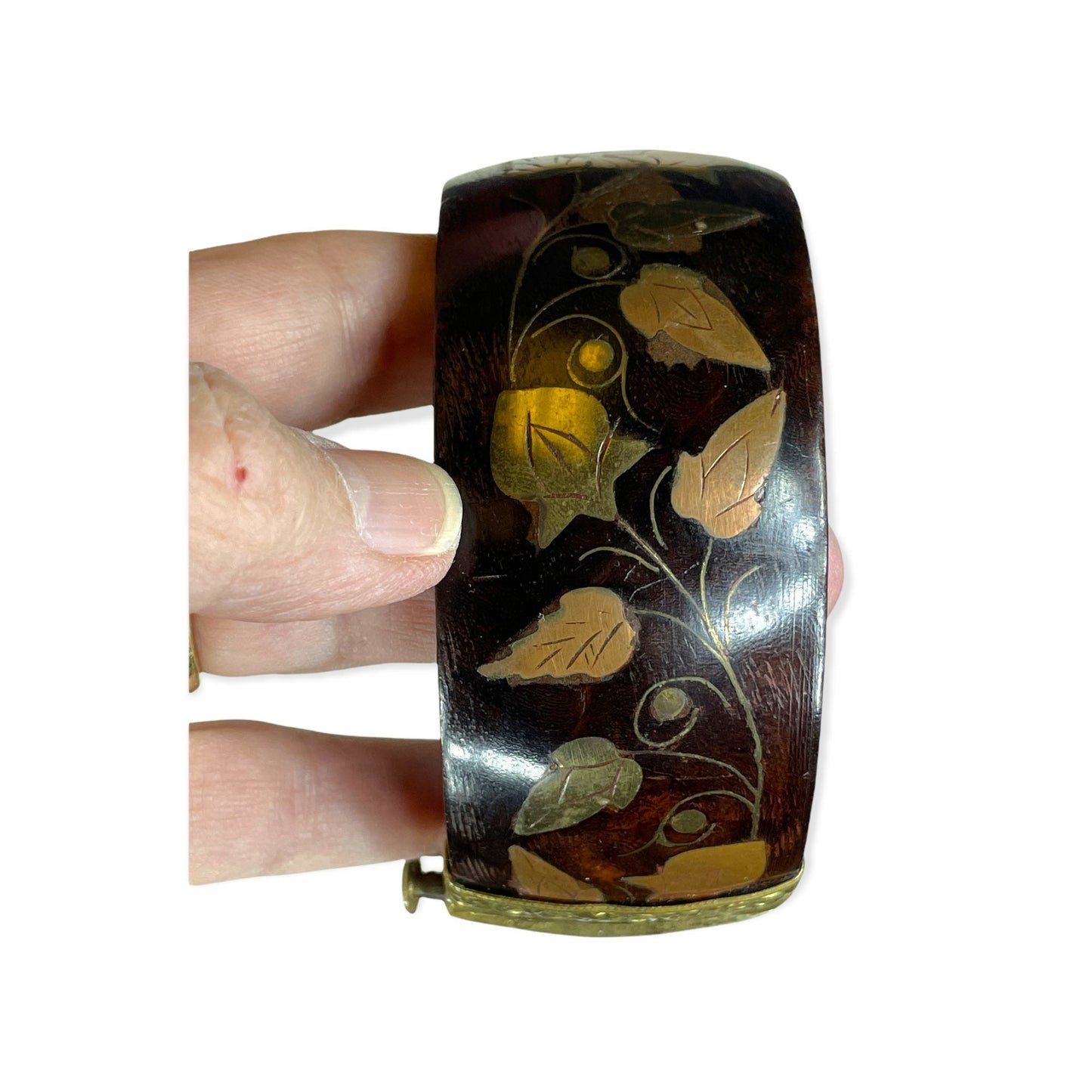 Wide wooden bangle bracelet with copper and brass floral inlay design